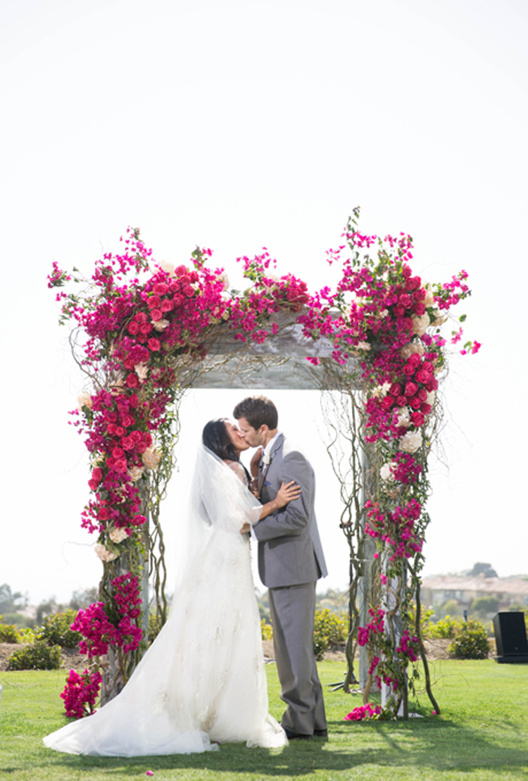 You may kiss the bride - Pink flowers arch | More on: http://mysweetengagement.com/you-may-kiss-the-bride/