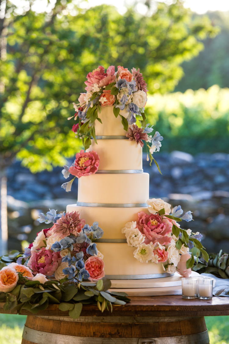 Colorful flowers wedding cake | See more: http://mysweetengagement.com/15-extraordinary-wedding-cakes-for-all-wedding-styles