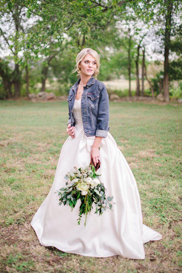 Denim jacket as bridal cover up. // 10 Gorgeous Cover Up Ideas to Keep the Bride Warm and Stylish this Winter. // http://mysweetengagement.com