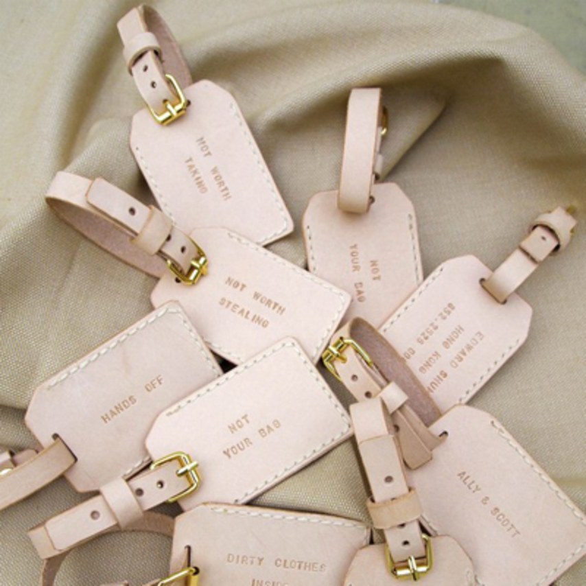 Perfect destination wedding favor idea: customized leather luggage tags. // Wedding favor ideas your guests will love