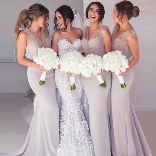 Stunning bridal party portrait. Check out these 9 ideas of neutral bridesmaid dresses. // mysweetengagement.com