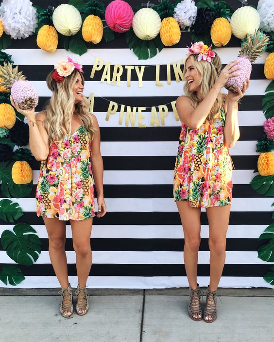 Tropical Bridal Shower Ideas: Stripes and pineapples for a fun photo backdrop // mysweetengagement.com