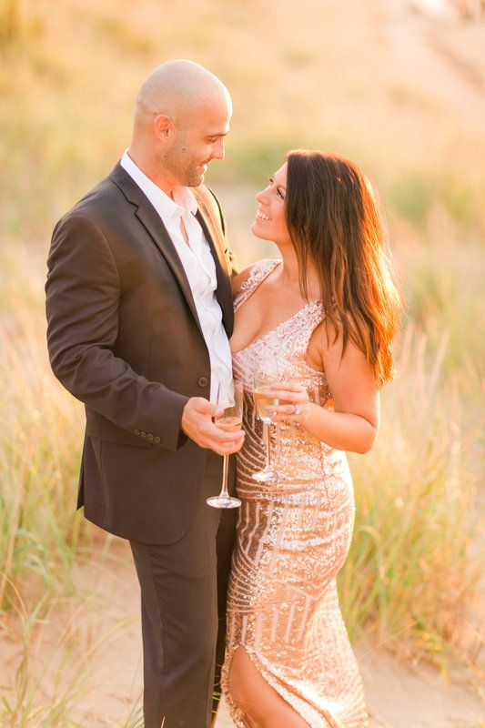 Loving this Long Sequin Dress. Romantic Outdoor Picture with a Champagne Pop. Photo By Kirstyn Marie Photography. // Don't know what to wear for your engagement pictures? Check out these 10 Formal Engagement Photo Outfit Ideas. // http://mysweetengagement.com