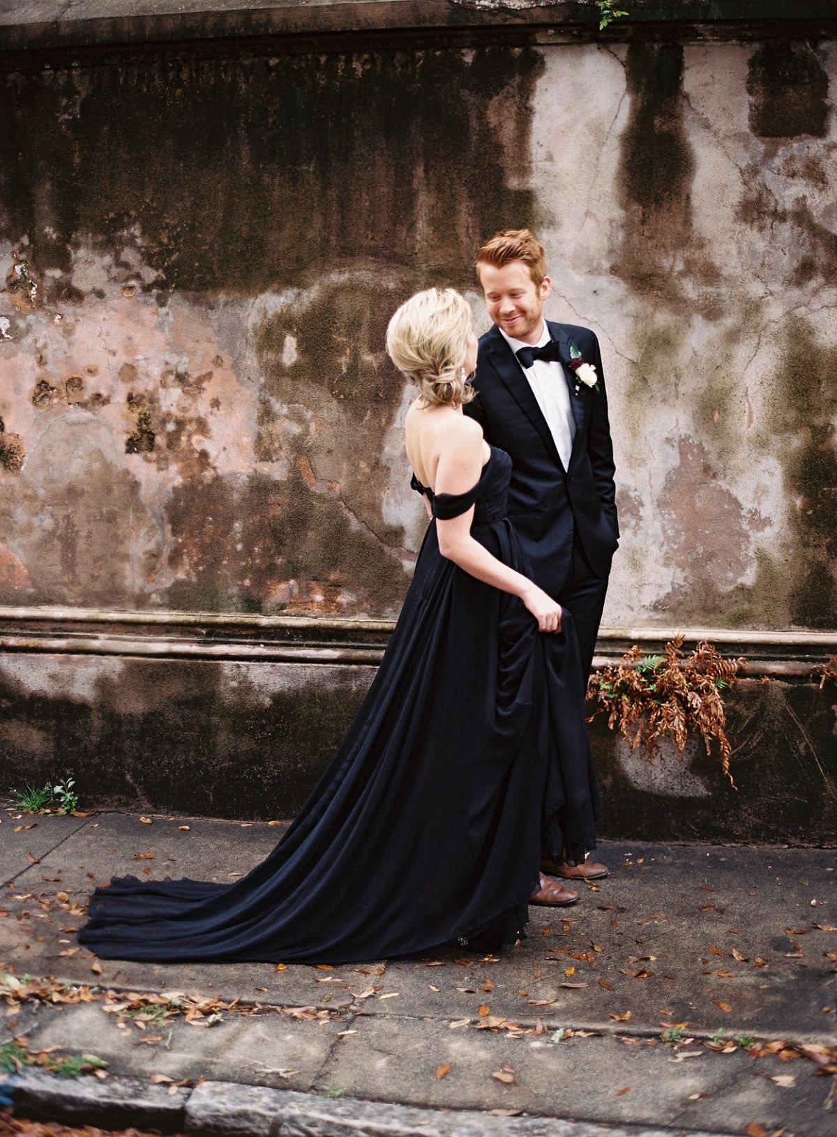 Love her black gown and his fancy tuxedo. Photo by Ashley Cox // Don't know what to wear for your engagement pictures? Check out these 10 Formal Engagement Photo Outfit Ideas. // http://mysweetengagement.com