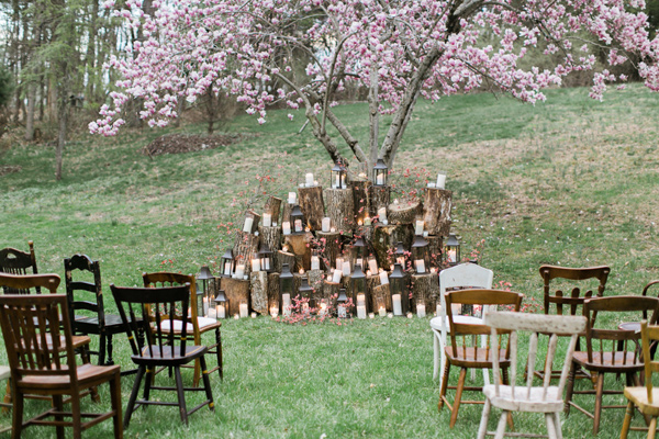 Garden wedding ceremony with wood and candles altar by the tree. // 15 Stunning Ways to Decorate with Candles // http://mysweetengagement.com