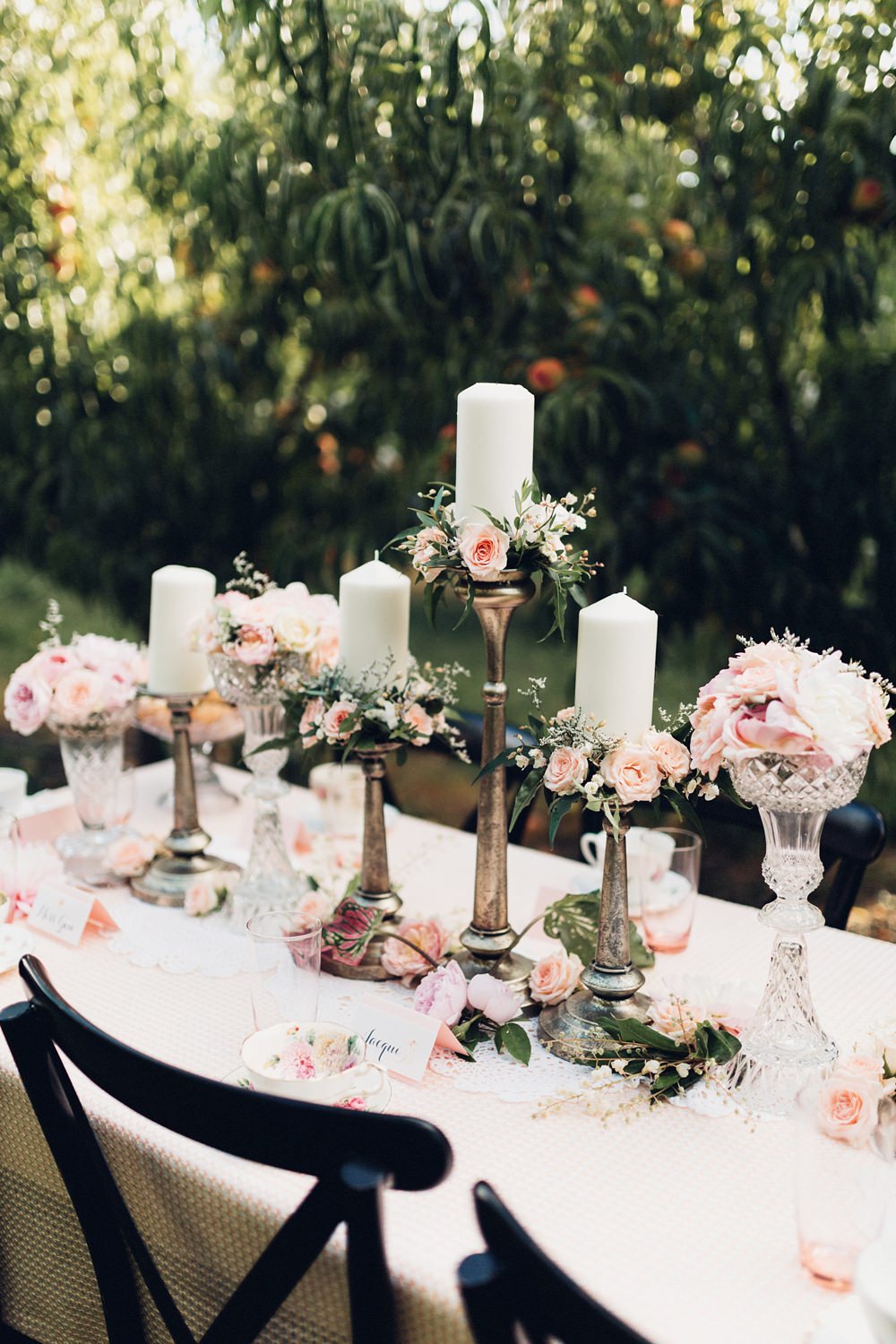 Romantic Blush Garden Wedding Centerpiece Decoration with Candles and Roses // 15 Stunning Ways to Decorate with Candles // http://mysweetengagement.com