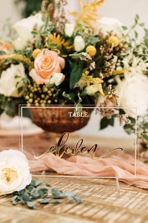 Modern affair: Acrylic wedding decor and ideas. Acrylic table number with laser cut gold and gold calligraphy. // mysweetengagement.com