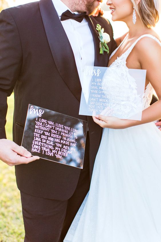 Modern affair: Acrylic wedding decor and ideas. His and hers wedding vows written on transparent perspex sheets. // mysweetengagement.com
