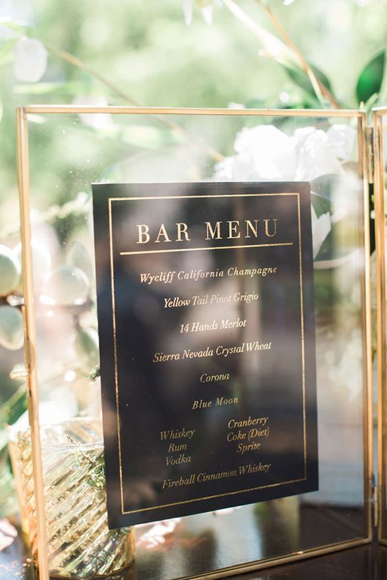 Modern affair: Acrylic wedding decor and ideas. Sheer perspex, gold and black bar menu sign. // mysweetengagement.com
