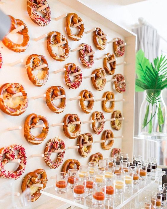 Pretzel wall installation for a modern and fun wedding. See More Trendy and Creative Ideas to Serve Pretzel on Your Wedding. | My Sweet Engagement