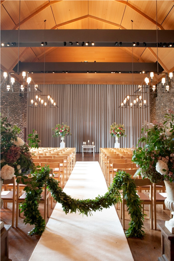 For a fresh and natural indoor wedding ceremony look, you don't need more than a greenery and wood combo. // ❤ Check Out These Gorgeous 20 Indoor Wedding Ceremony Ideas. // http://mysweetengagement.com/indoor-wedding-ceremony-ideas