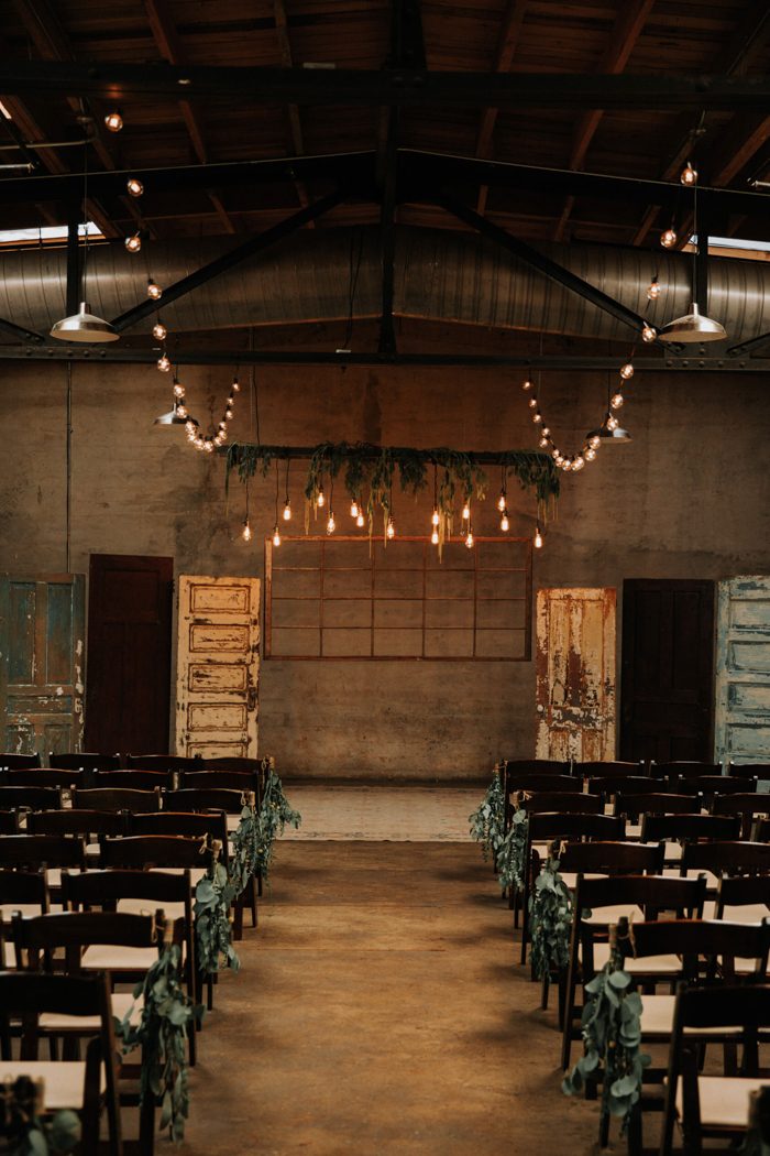 For a rustic charm, use vintage door as backdrop for your indoor wedding ceremony. // ❤ Check Out These Gorgeous 20 Indoor Wedding Ceremony Ideas. // http://mysweetengagement.com/indoor-wedding-ceremony-ideas