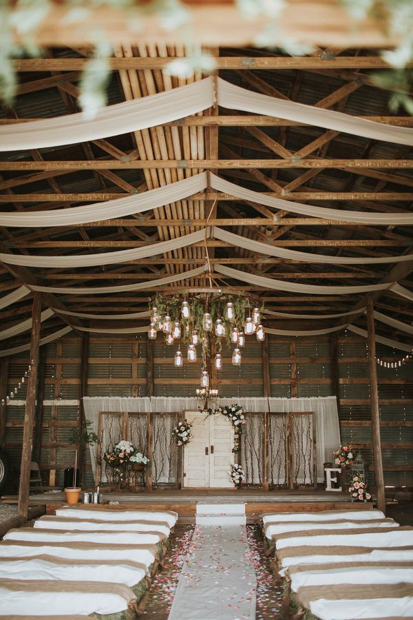 To compliment your rustic wedding ceremony, use vintage door as a backdrop. // ❤ Check Out These Gorgeous 20 Indoor Wedding Ceremony Ideas. // http://mysweetengagement.com/indoor-wedding-ceremony-ideas