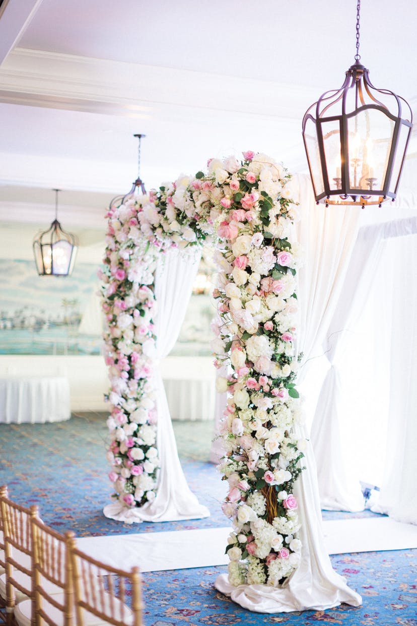 Blush pink flowers and draping backdrops and gold accents will set the perfect tone for a classic and romantic indoor wedding ceremony. // ❤ Check Out These Gorgeous 20 Indoor Wedding Ceremony Ideas. // http://mysweetengagement.com/indoor-wedding-ceremony-ideas