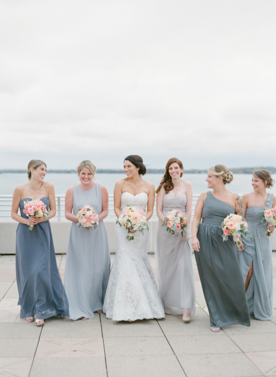 Gorgeous mismatched bridesmaid dresses on shades of grey. // See more: Mix It Up: 15 Mix and Match Bridesmaid Dresses Done Right // https://mysweetengagement.com