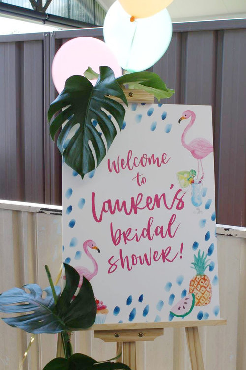 Tropical Bridal Shower Ideas: Welcome your guests with a lovely flamingo sign // mysweetengagement.com