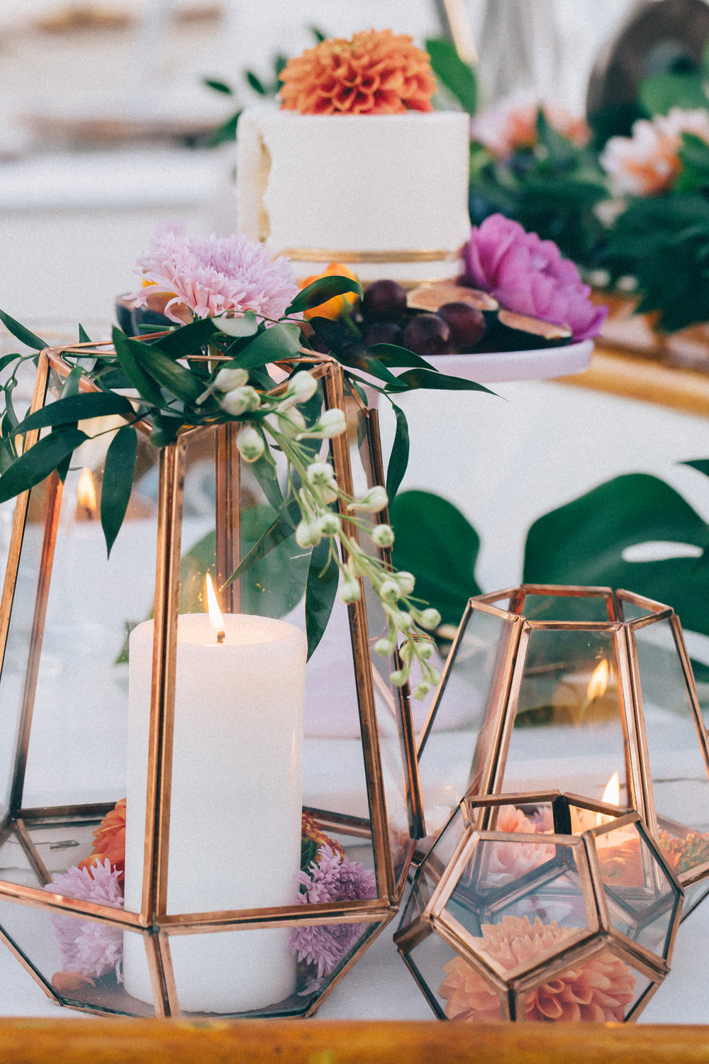Geometric copper candle holder for a modern wedding centerpiece. // 15 Stunning Ways to Decorate with Candles // https://mysweetengagement.com