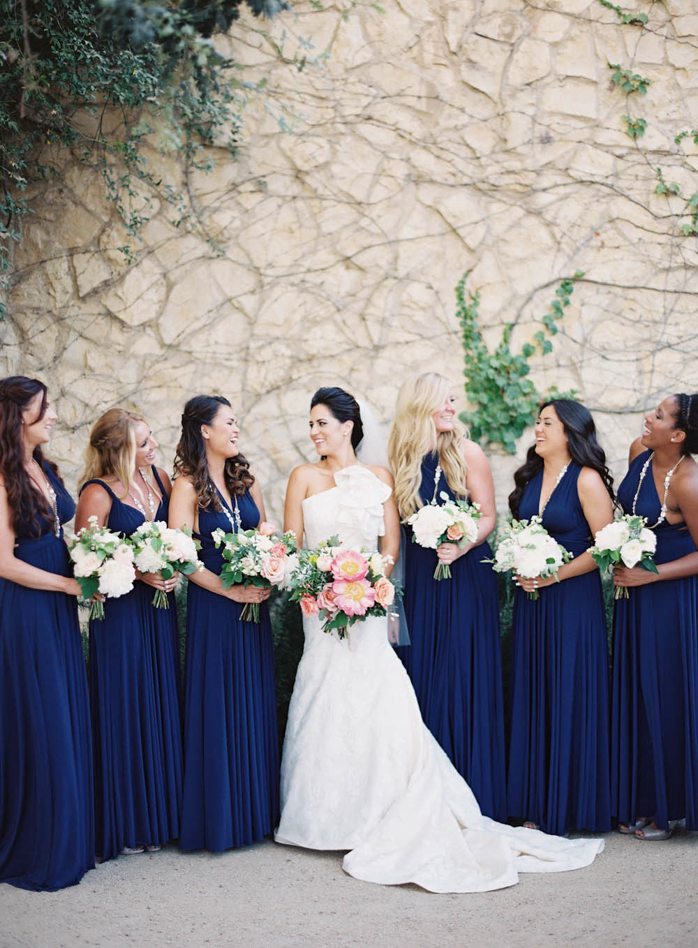 Mix and match bridesmaid dresses on the navy blue color - one shoulder and V neck. // Get inspired with this gallery filled with 50+ awesome wedding ideas for your bridesmaids, including dresses, proposals & more. // mysweetengagement.com