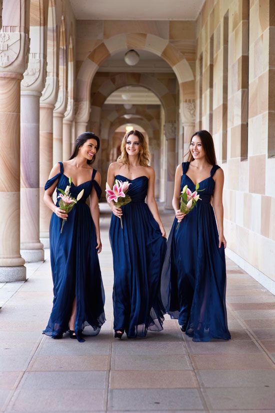 Lovely flowy navy blue bridesmaid dresses with straps and strapless. Perfect color combination with the pink lily flower bouquet. // Navy Blue Bridesmaid Dresses // mysweetengagement.com
