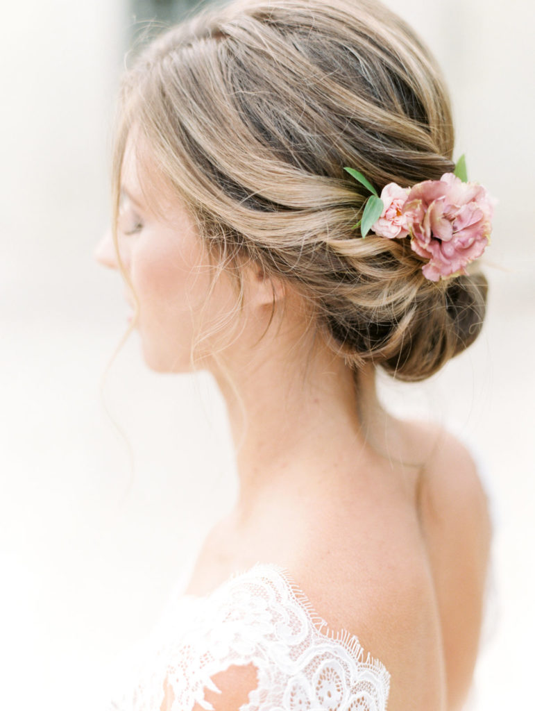  Minimalist Romantic Bridal Updo embellished with delicate fresh flowers. 