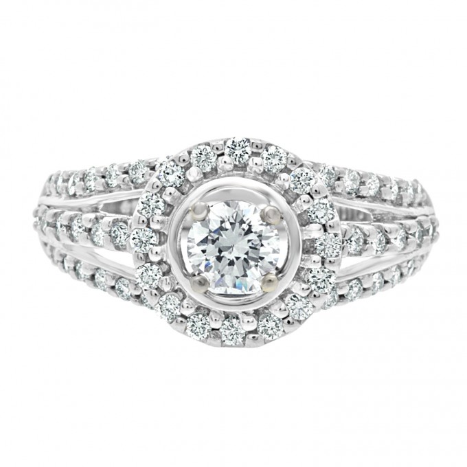 Show stopper antique style diamond ring with a round brilliant stone surrounded by round brilliant cut diamonds halo and a triple band of round brilliant set diamonds // Image by Loyes Diamonds // mysweetengagement.com