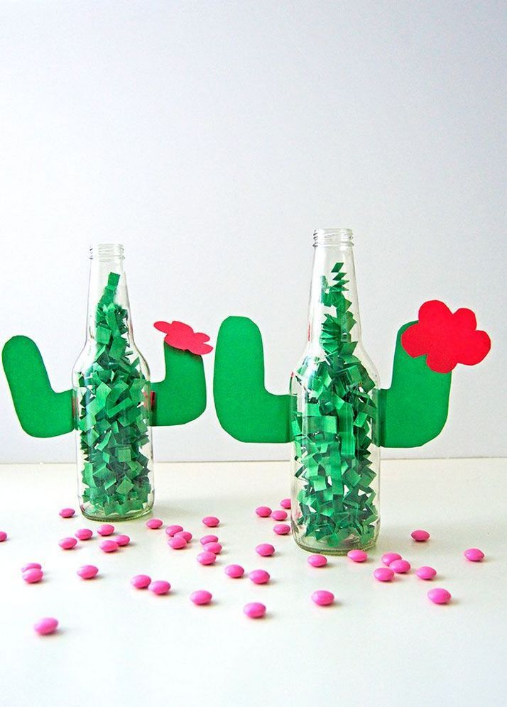 Simple empty bottles can turn to a cute cactus centerpiece decoration for a 5 de Mayo themed bridal shower. // Get inspired with these Elegant Mexican Fiesta / Cinco de Mayo Themed Bridal Shower Ideas. // mysweetengagement.com