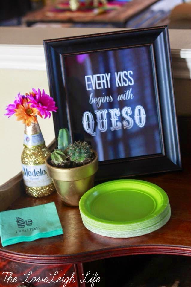 "Every kiss begins with queso" sign for a fun cinco de mayo themed bridal shower // Get inspired with these Elegant Mexican Fiesta / Cinco de Mayo Themed Bridal Shower Ideas. // mysweetengagement.com