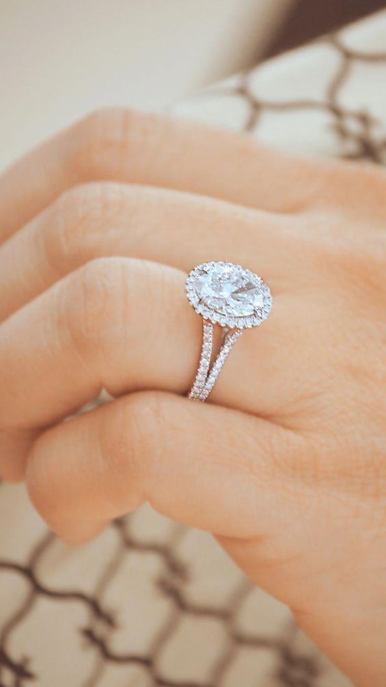 Platinum oval engagement ring with halo and split band inspiration. // mysweetengagement.com