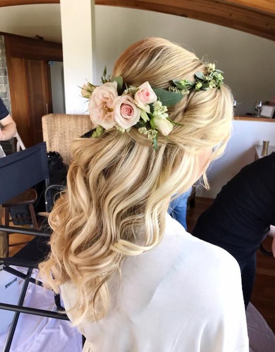 Romantic wavy half up half down hairstyle with gorgeous blush roses floral crown. // Gorgeous half up half down bridal hairstyle ideas to impress on your wedding day. // mysweetengagement.com