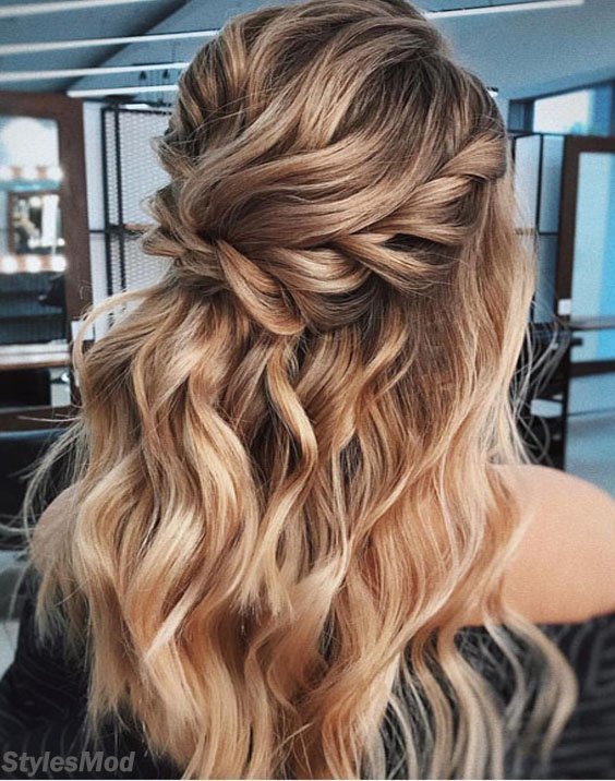 Loose curls twisted half up half down messy hairdo idea. // Gorgeous half up half down bridal hairstyle ideas to impress on your wedding day. // mysweetengagement.com