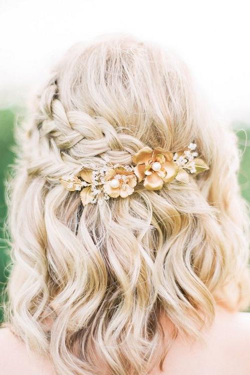 Short length wavy braided half up half down hair idea. // Gorgeous half up half down bridal hairstyle ideas to impress on your wedding day. // mysweetengagement.com