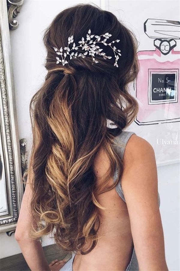 Beautiful twisted half up half do hair idea with unique headpiece embellishment. // Gorgeous half up half down bridal hairstyle ideas to impress on your wedding day. // mysweetengagement.com
