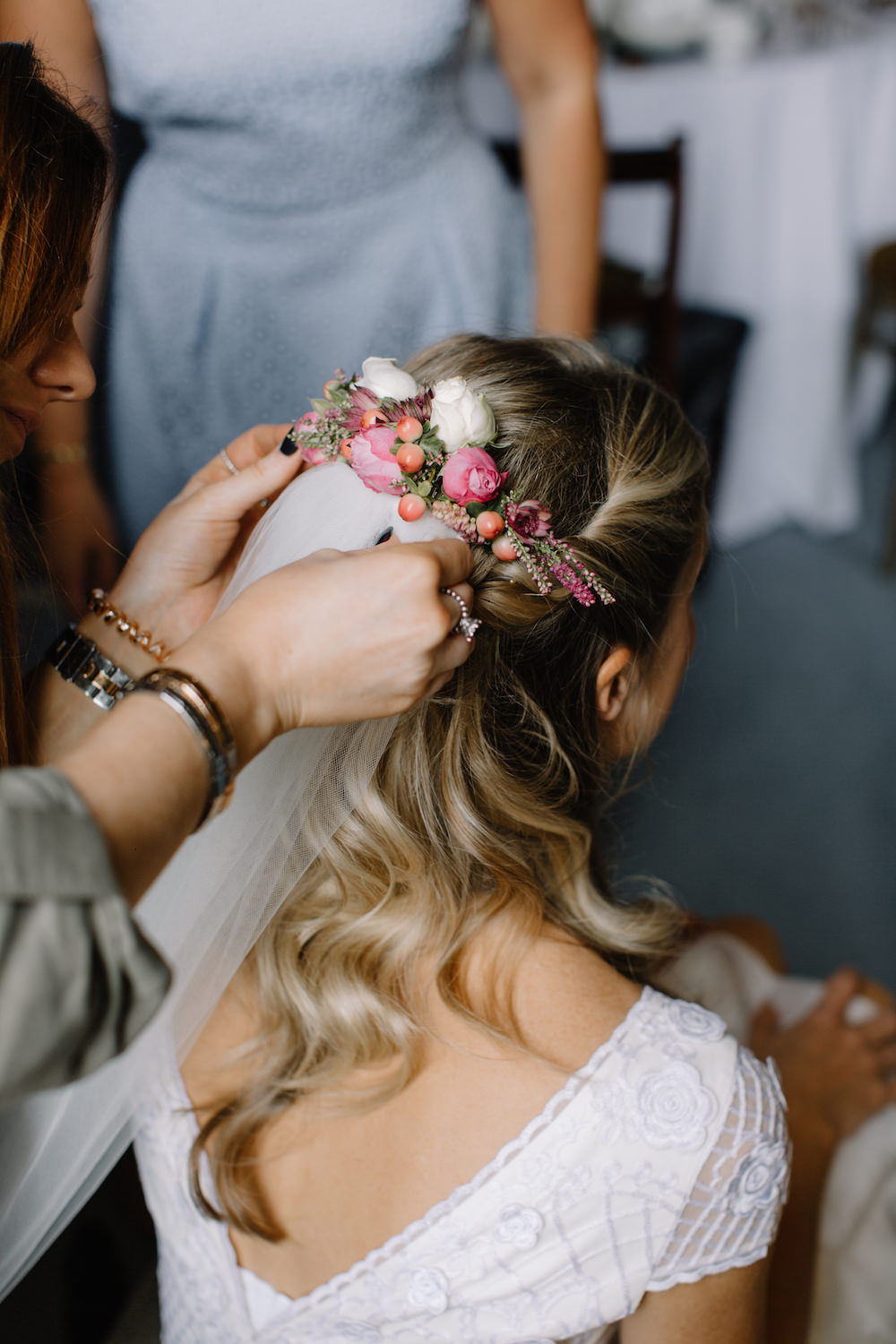Romantic half up half down hairstyle with floral piece and veil. // Gorgeous half up half down bridal hairstyle ideas to impress on your wedding day. // mysweetengagement.com