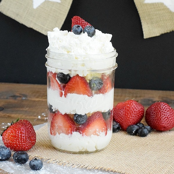 Red, White and Blue: Awesome and elegant patriotic decorations for a 4th of July theme bridal shower. // Easy dessert to copy for your shower: Yummy strawberries, blueberries cupcake in a jar. // mysweetengagement.com