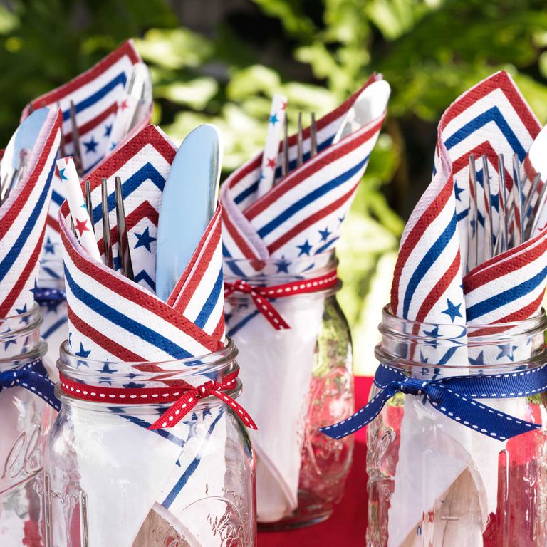 Red, White and Blue: Awesome and elegant patriotic decorations for a 4th of July theme bridal shower. // These cute and convenient grab and go utensils with American napkins inside mason jars will add the perfect touch to your Americana party. // mysweetengagement.com