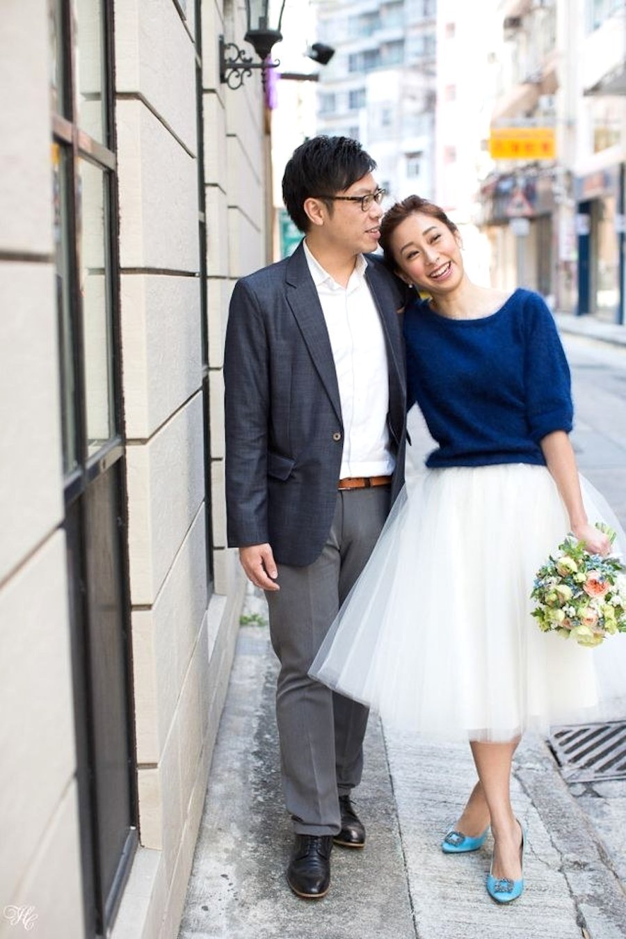 Casual chic couple outfit idea for a courthouse idea. Tulle skirt and blue sweater and heels for good luck and a pop of color. // See more: 20 Stunning Civil Wedding Outfit Ideas to Make it Official In Style. // mysweetengagement.com