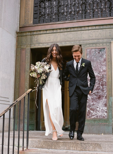 Elegant couple outfit for a fall or winter courthouse wedding. // See more: 20 Stunning Civil Wedding Outfit Ideas to Make it Official In Style. // mysweetengagement.com