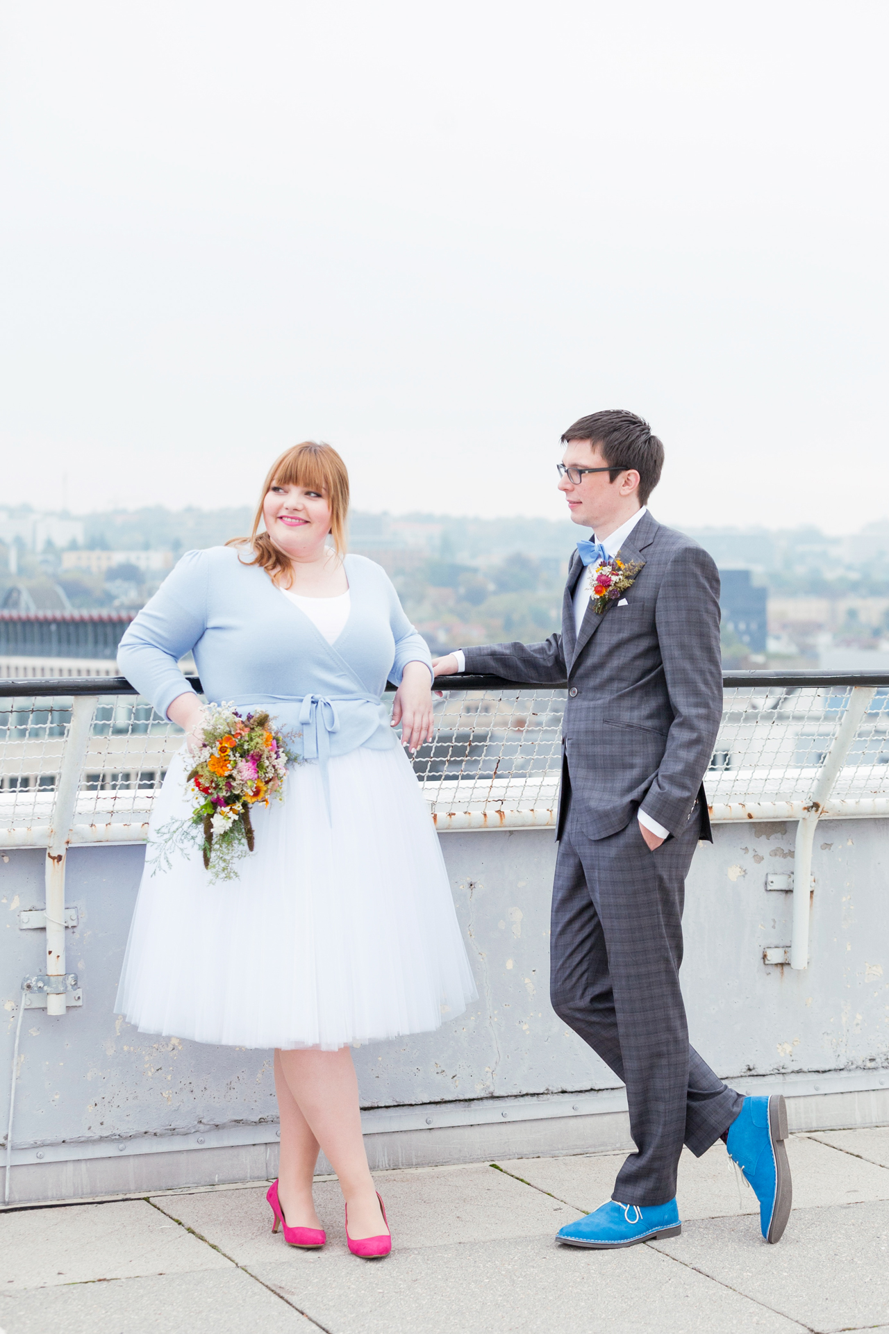 Tulle skirt and dusty blue sweater for good luck. Loving the pop of color with her pink shoes. // See more: 20 Stunning Civil Wedding Outfit Ideas to Make it Official In Style. // mysweetengagement.com