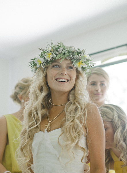 Blonde bride with long natural curly hair and floral crown // mysweetengagement.com