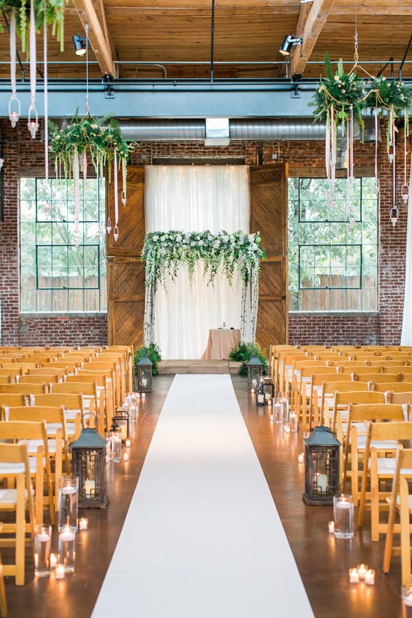 For a fresh and natural indoor wedding ceremony look, you don't need more than a greenery and wood combo. // ❤️ Check Out These Gorgeous 20 Indoor Wedding Ceremony Ideas. // https://mysweetengagement.com/indoor-wedding-ceremony-ideas