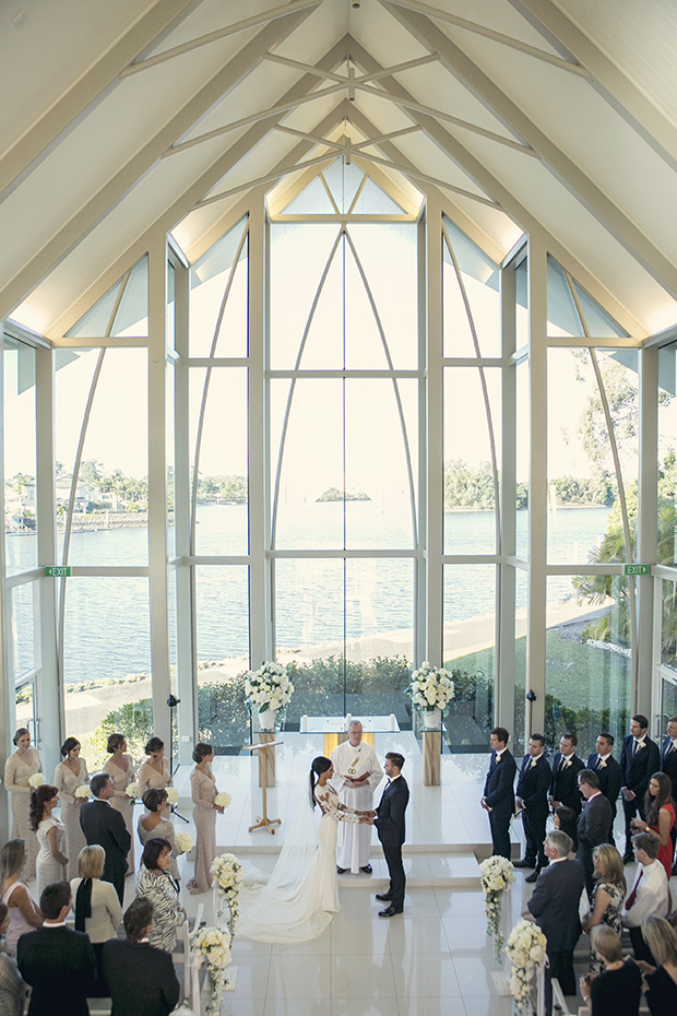 Indoor wedding ceremony with a view! // ❤️ Check Out These Gorgeous 20 Indoor Wedding Ceremony Ideas. // https://mysweetengagement.com/indoor-wedding-ceremony-ideas
