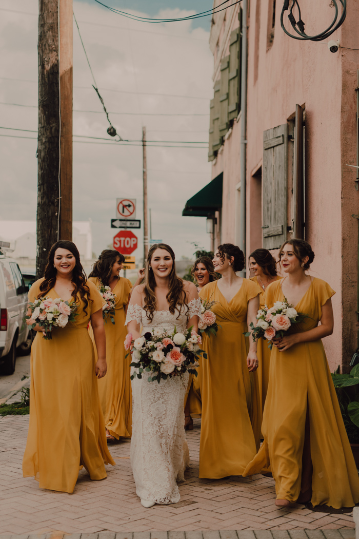 yellow mustard bridesmaid dresses with v necks and maxi skirts