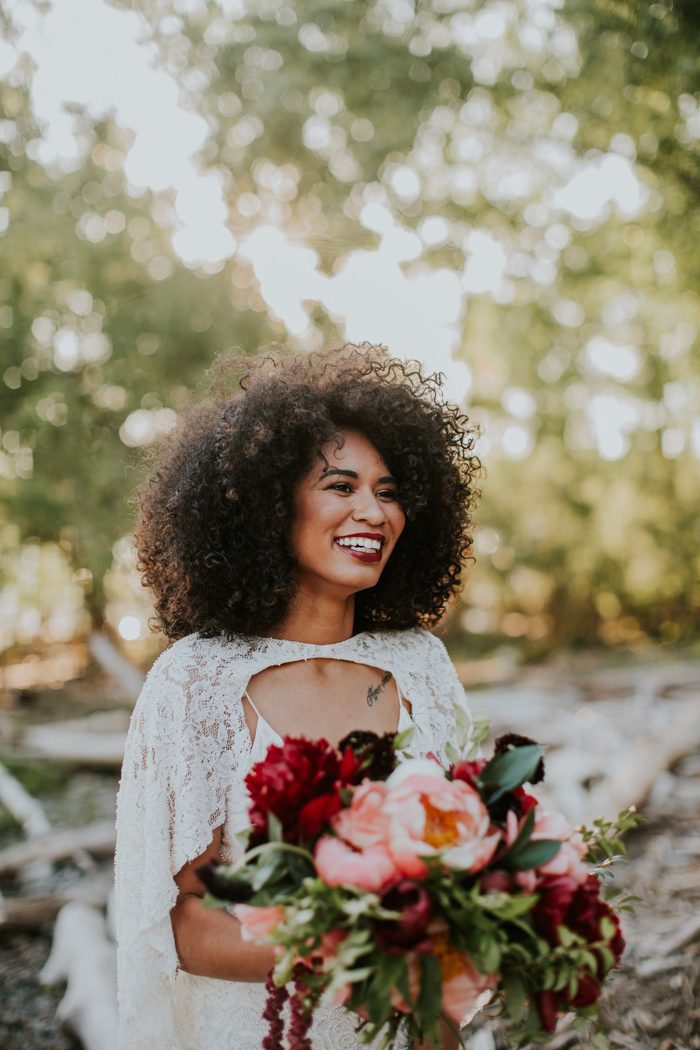 Natural curly hair bride with red lipstick // mysweetengagement.com