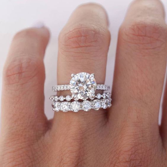 round engagement ring with stacking wedding bands
