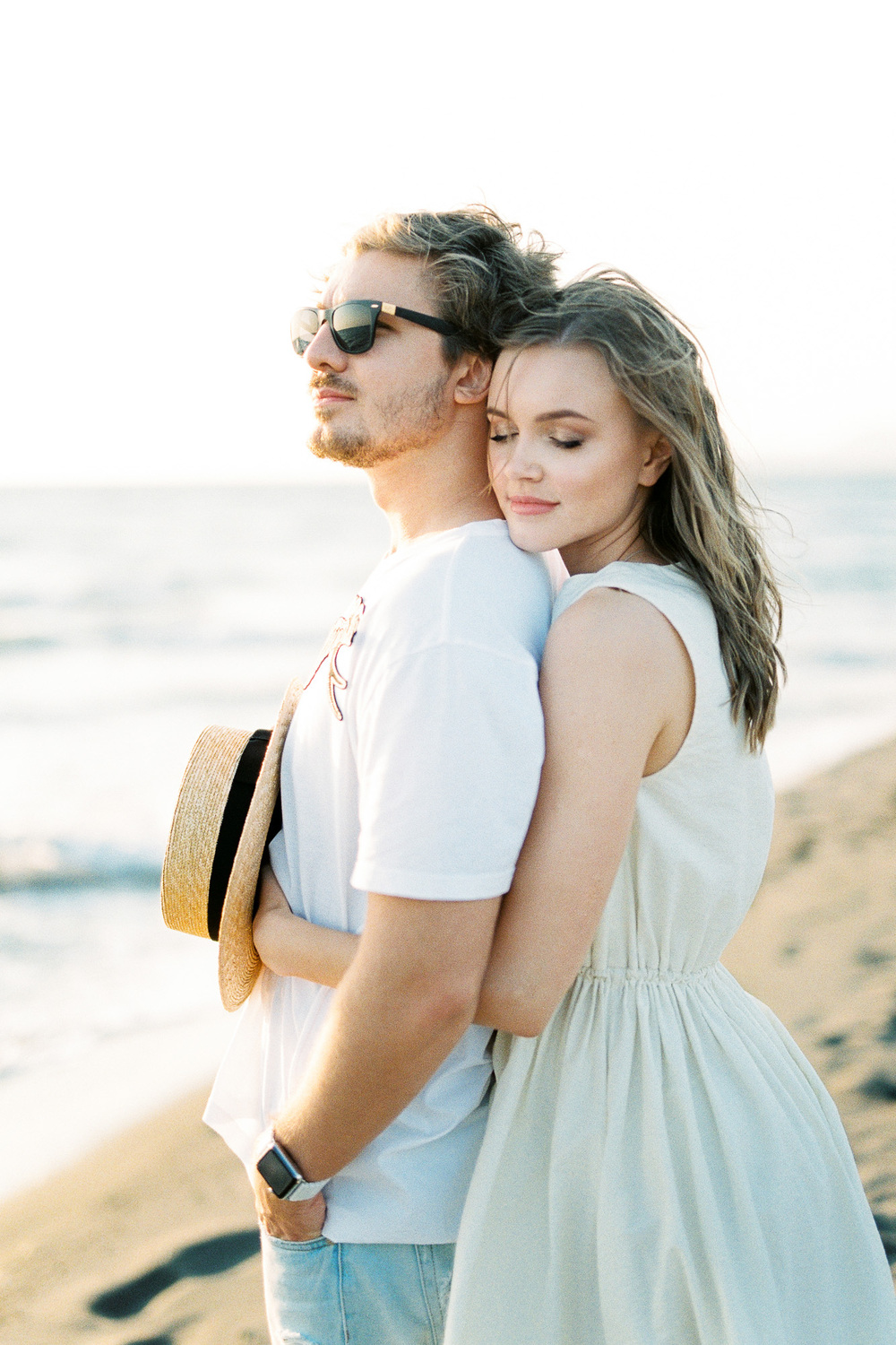 couple on a beach engagement photoshoot