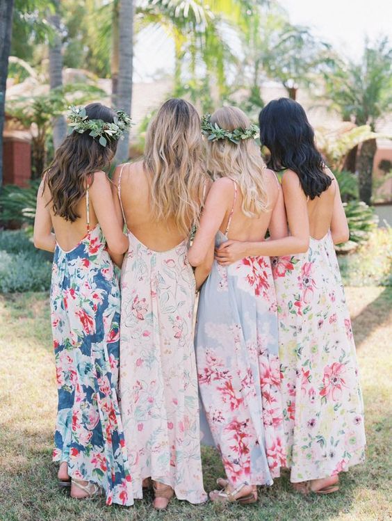 bridesmaids back portraits with floral dresses and greenery crowns