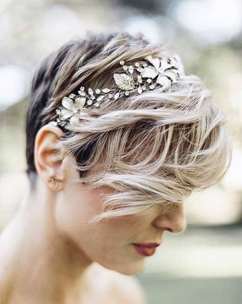 short wedding hairstyle idea with floral headpiece for pixie hair