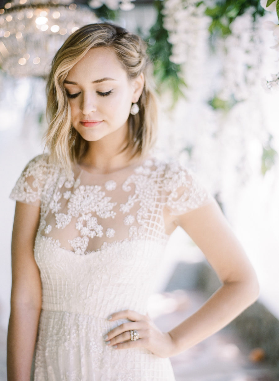 blonde bride with short length hair down side parted with soft waves