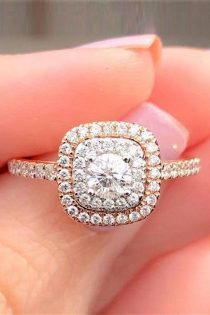 double halo engagement ring with mixed colored setting