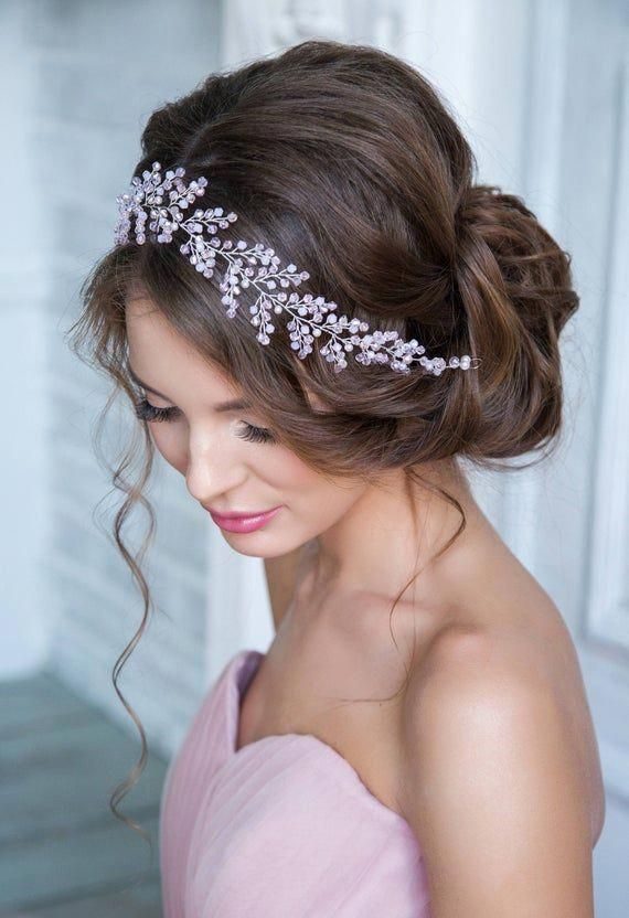 elegant romantic messy hair bun for wedding day with tiara